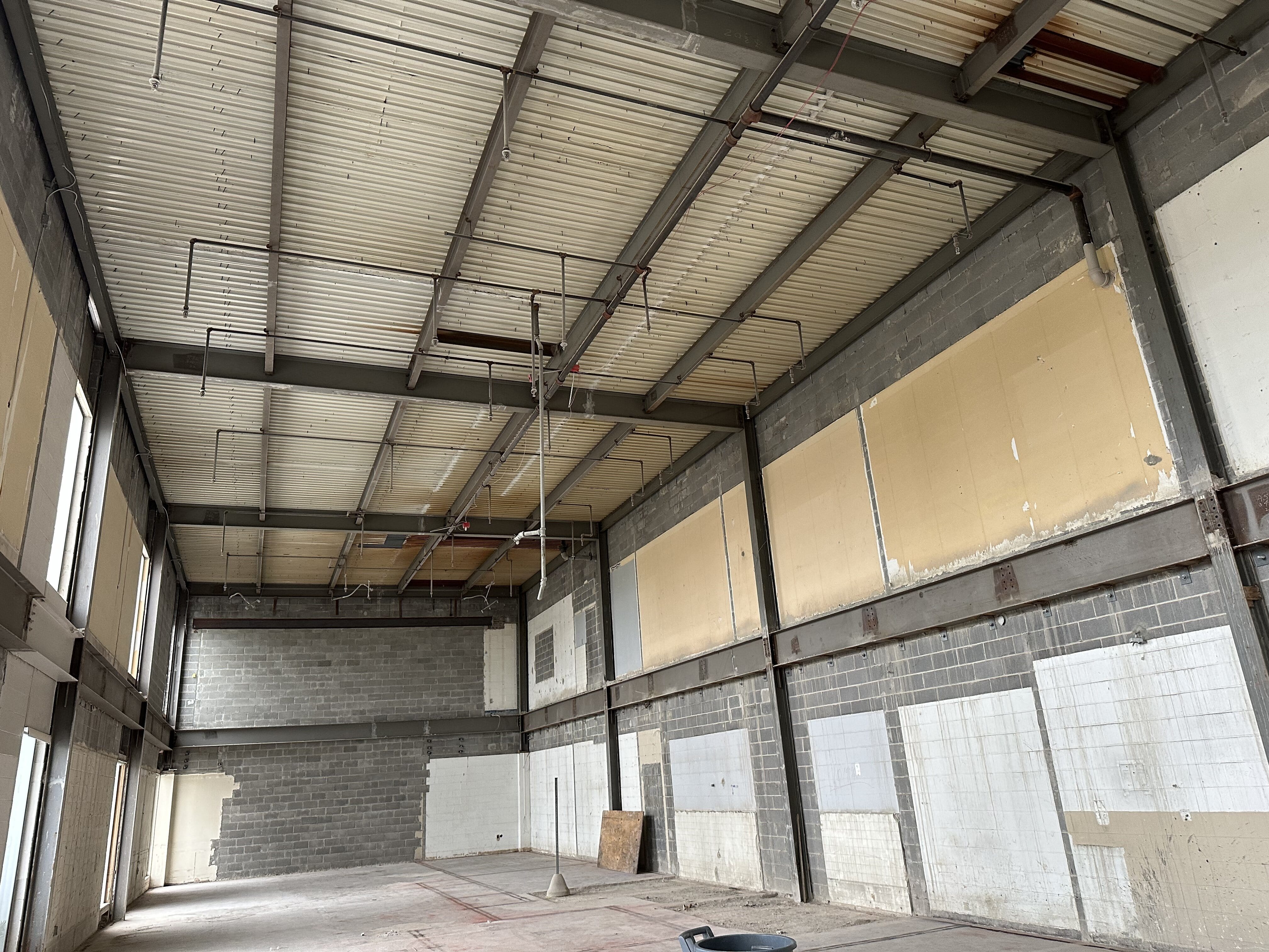Room with ceiling removed for piping work