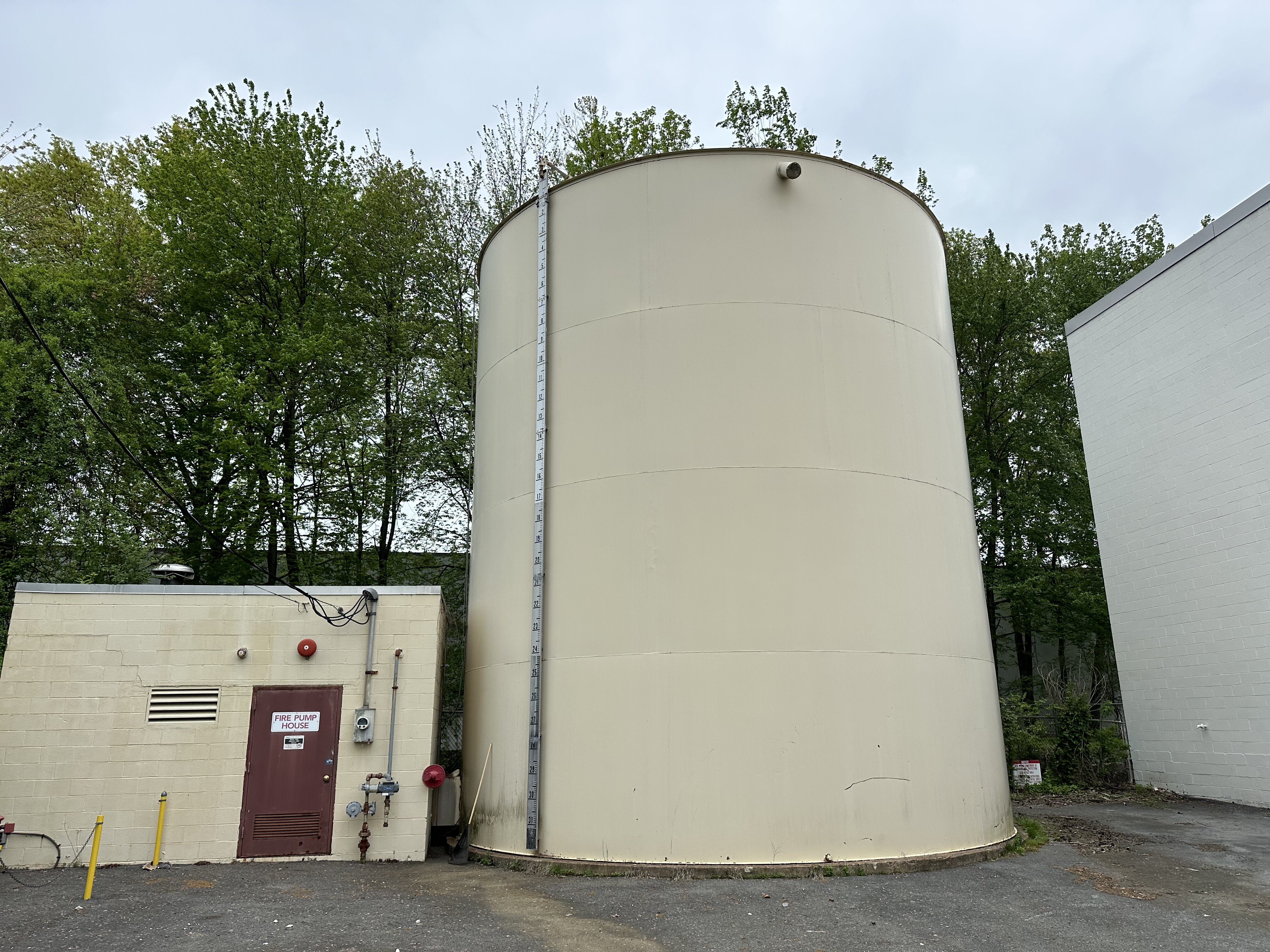 White water tank in parking lot