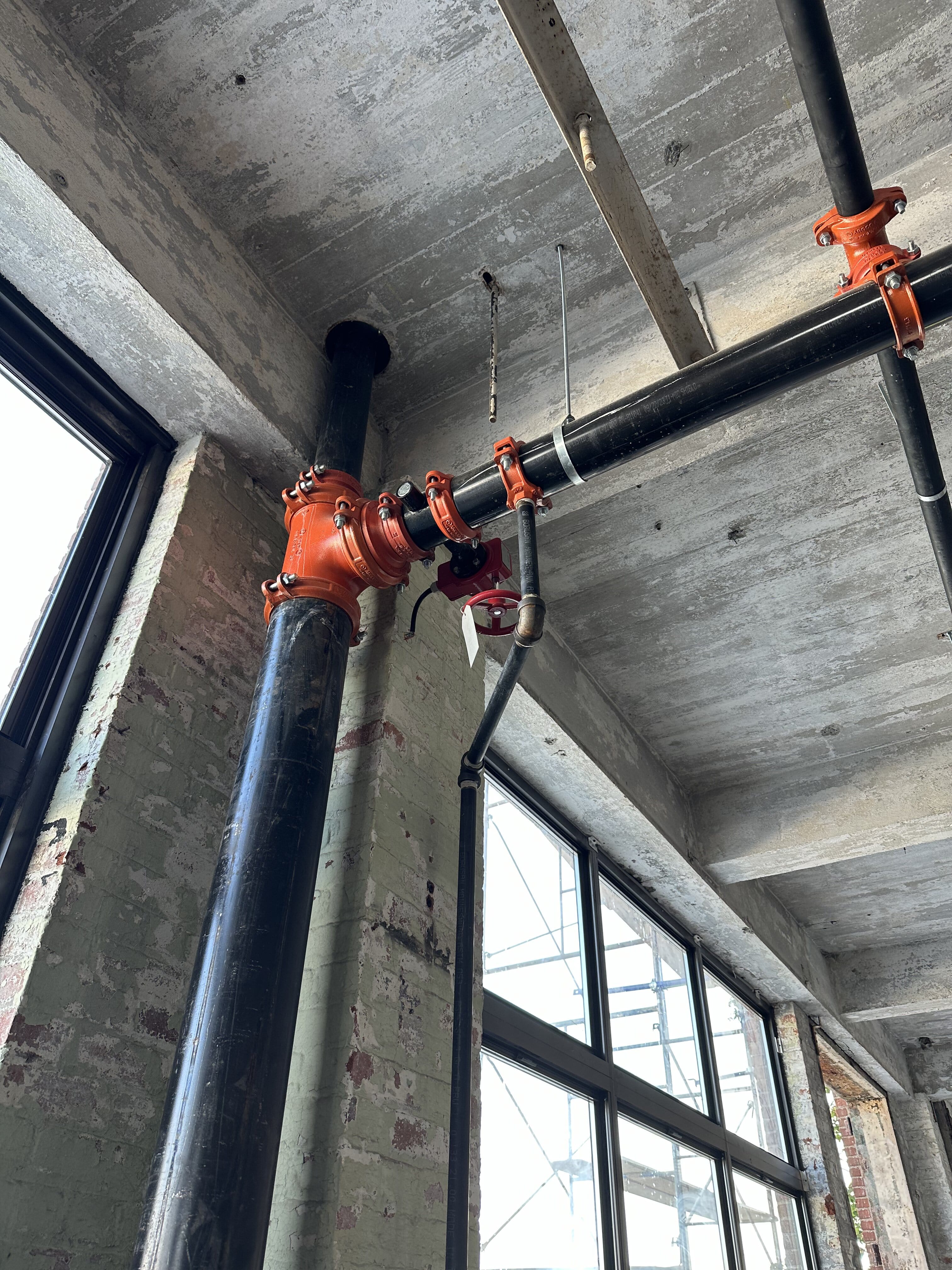 Technician drilling pipe